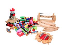 A painted wooden toy model railway train set. Including track, trains and rolling stock, etc.