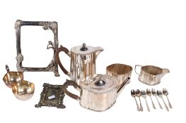 A collection of assorted silver plated items. Including a tea set, photo frame, etc.