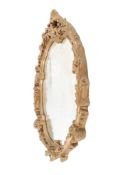 A mid-century gilt framed oval wall mirror. Having swags and floral decoration.