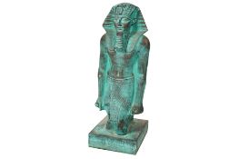 Composite Egyptian figure of a Pharaoh having verdigris finish