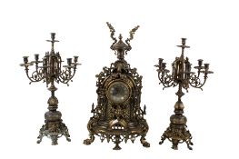 Reproduction French style brass battery operated clock garniture.