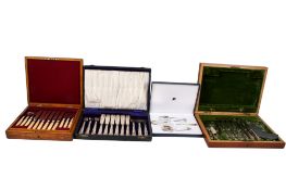 A group of four assorted silverplated cased sets of cutlery.