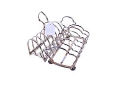 Two silver plated toast racks.