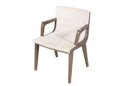 A Maxalto Acanto open armchair. Having a solid wood frame and a fabric covered seat.