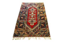A Persian style rug.