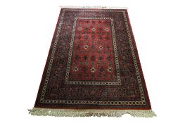 A 20th century Persian style woven rug.