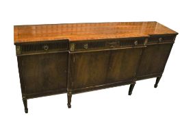 A 20th century Waring and Gillow mahogany veneered sideboard.