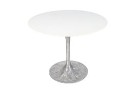 A mid-century 'tulip' style table. Having a white circular top raised on a metal base.