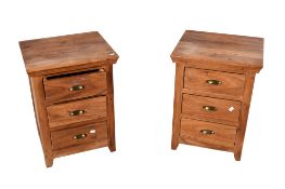 A pair of contemporary hardwood bedside cabinets. Having three drawers.
