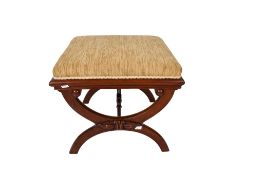 An antique Regency style mahogany X- framed stool. With an upholstered seat.