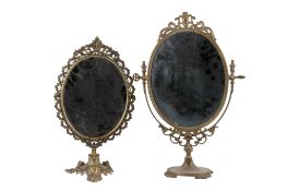 Two oval table dress mirrors (one AF). Brass frames. Max.