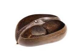 Coco de Mer nut with carved detail formed as a basket.