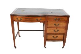 Edwardian cross banded mahogany single pedestal desk.