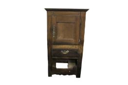 A 19th century French oak cupboard.