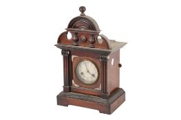 A mahogany cased mantel clock. Eight-day striking to a gong with Arabic numerals.