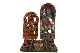 Three polychrome decorated south East Asian carved wooden panels.