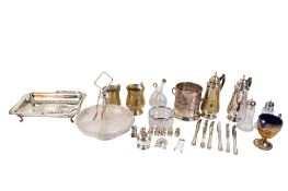 A group of assorted silver plated items. Including mugs, a bottle coaster and entree dishes, etc.