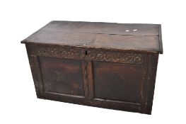 Antique oak coffer having twin fielded panel front. Two plank top.