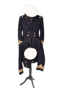 Royal Naval uniforms on a floor standing dress makers mannequin.
