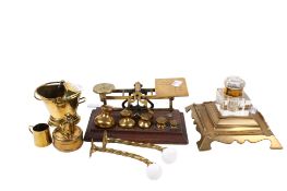 A collection of seven assorted brassware items.