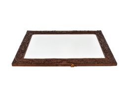 Rectangular oak framed wall mirror. Having carved oak leaf and acorn decoration.