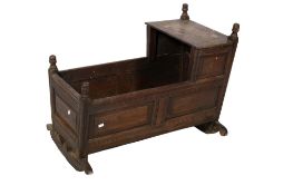 A vintage oak baby crib.