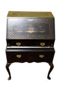 A 20th Century Queen Anne style chinoiserie lacquered bureau. Having later gilt decoration.