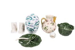 A group of assorted ceramics and a pair of bookends.