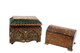 Two polychrome decorated Moorish wooden boxes having hinged covers.