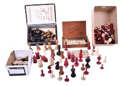A collection of assorted vintage chess, draughts and domino pieces.