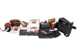 An assortment of vintage cameras and filters.