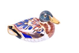A Royal Crown Derby duck.paperweight, gold stopper.