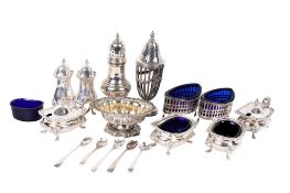 An assortment of silver and silver plated condiments.