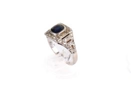 An 18ct white gold (tested) sapphire and diamond dress ring.
