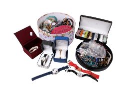A large collection of costume jewellery and wristwatches.