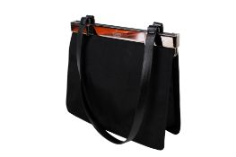 A Gucci black handbag.