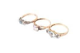 Three yellow metal and 9ct gold stone set rings.