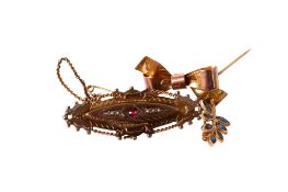 Three 9ct gold and yellow metal brooches.