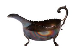 An Irish silver sauce boat.