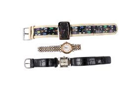 Three fashion wristwatches.