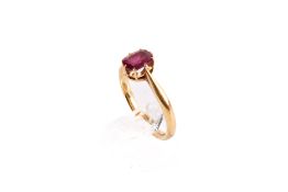 An 18ct gold and garnet ring.