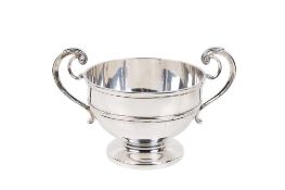 An early 20th century silver twin handled cup.