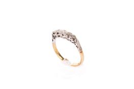 An 18ct gold and five stone diamond ring.