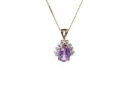 A 9ct gold (tested) amethyst pendant and chain.