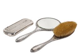 A silver backed brush and mirror set and a boxed razor.