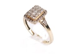 A 9ct gold diamond ring. Set with round brilliant cut diamonds of 0.