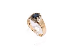 A 9ct gold and sapphire dress ring.