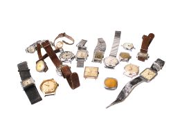 A collection of assorted wristwatches and parts.