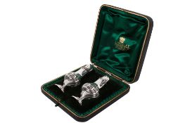 A pair of Victorian silver salt and pepper pots.