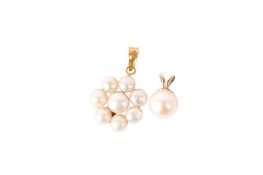Two cultured pearl pendants. One of flower form, W1.